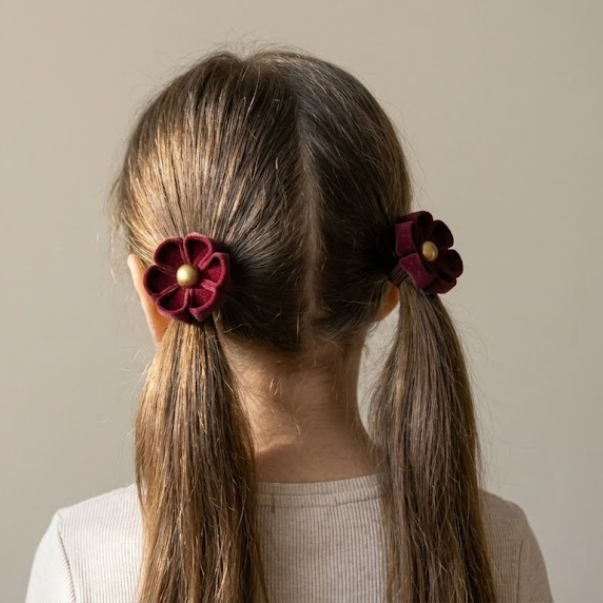 Set of two maroon hair clips