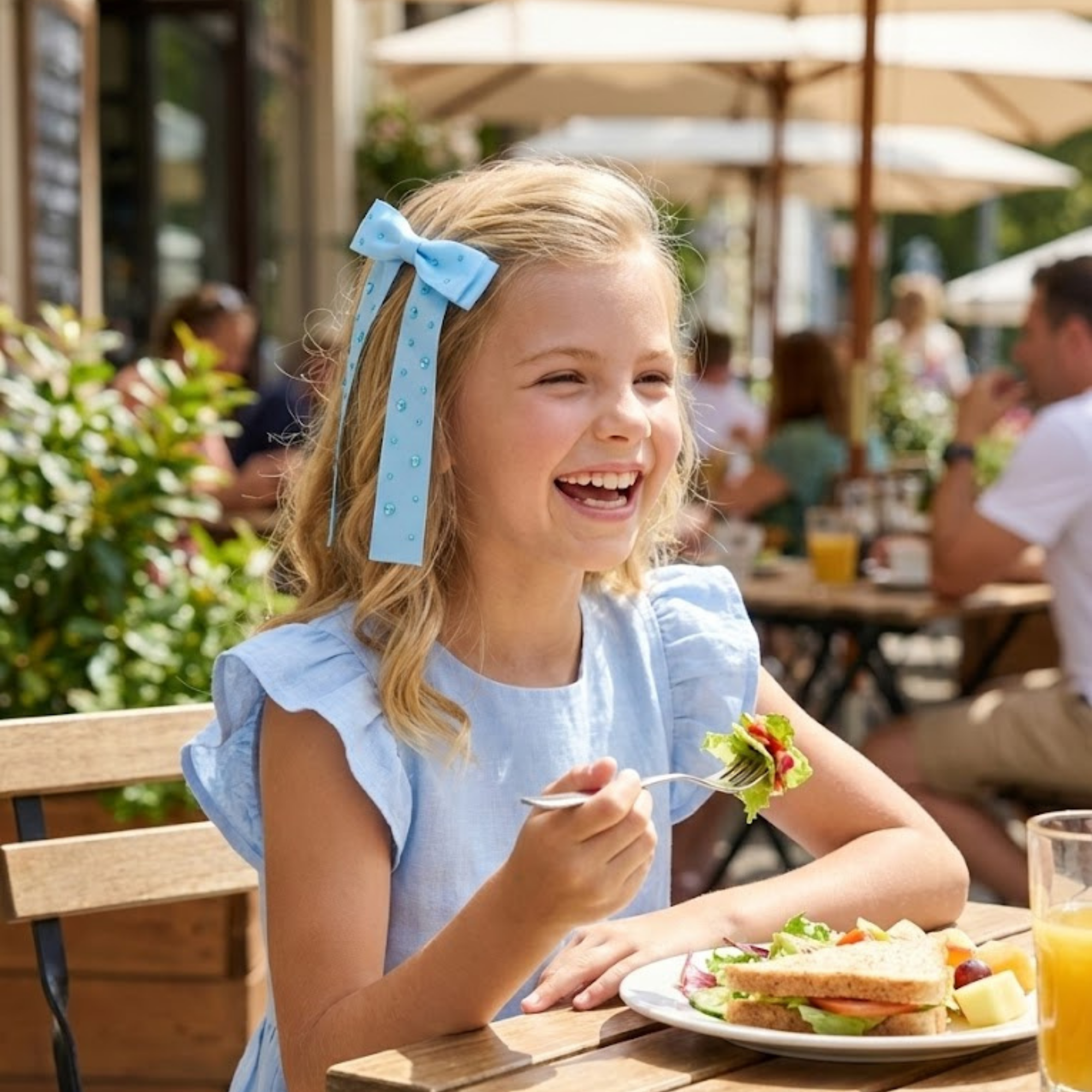 Blue Rhinestone Bow Clip